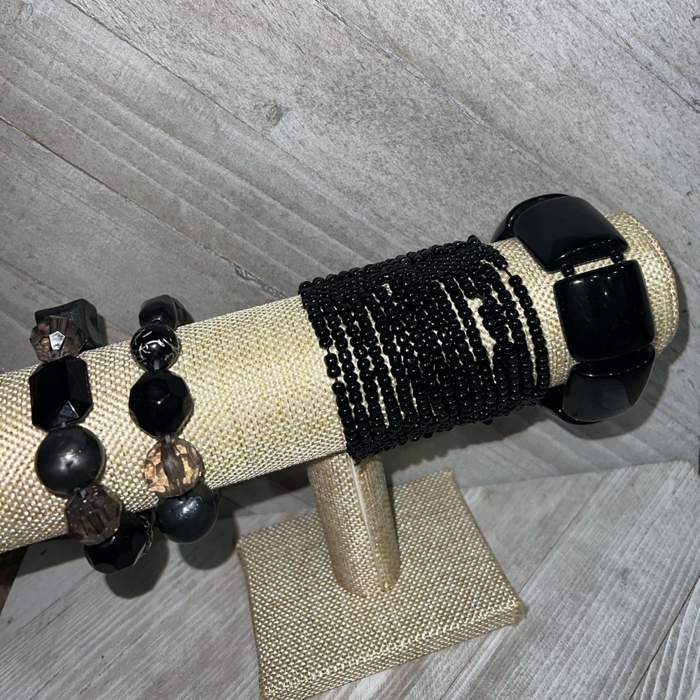 4 black bracelets